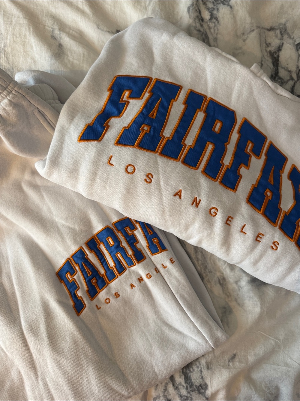 Edikted White Set with Blue Lettering and Orange Trim